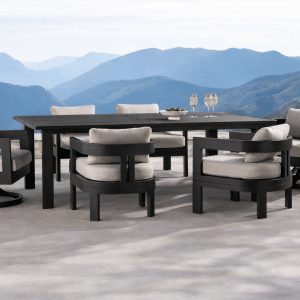 Valmont Luxury outdoor dining set with woven chairs and sunset patio setting