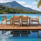 Premium outdoor teak dining table set with waterfront view
